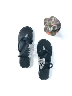 Oceanside Flat Sandals In Black Zebra